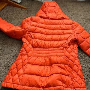 Michael Kors packable down jacket with removable hood.